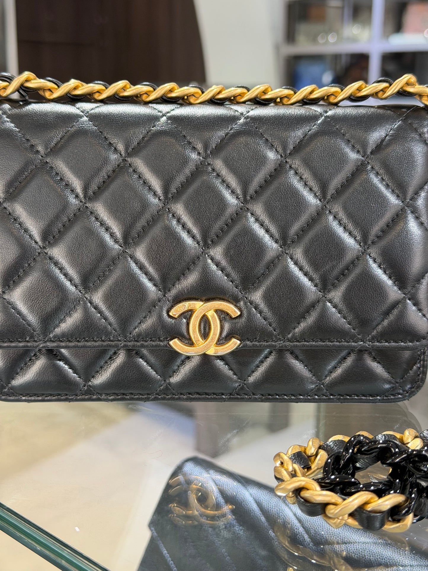 Pre-Owned CC Black Quilted Lambskin WOC Gold Hardware
