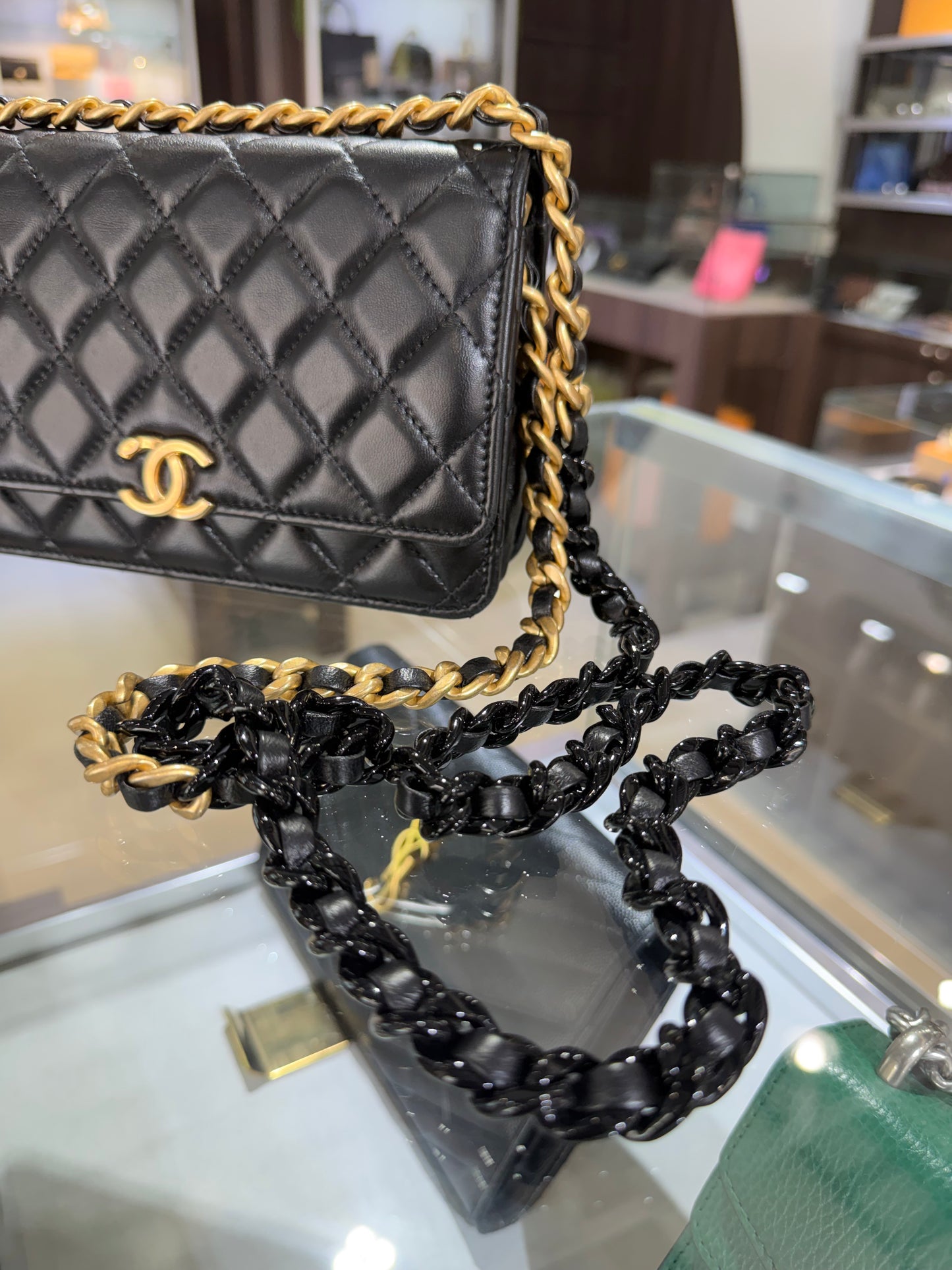 Pre-Owned CC Black Quilted Lambskin WOC Gold Hardware