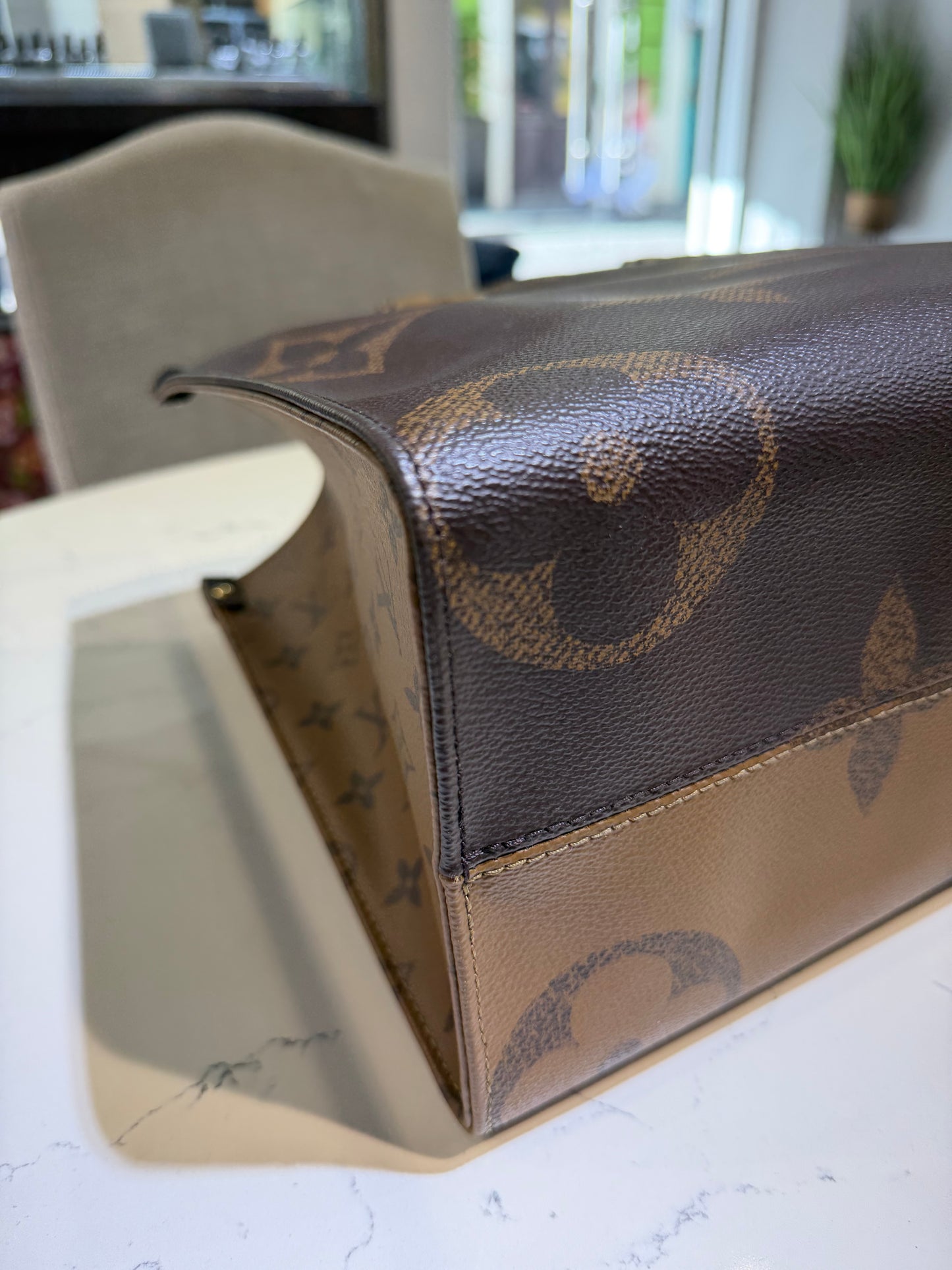 Pre-Owned LV OnTheGo MM Reverse Monogram