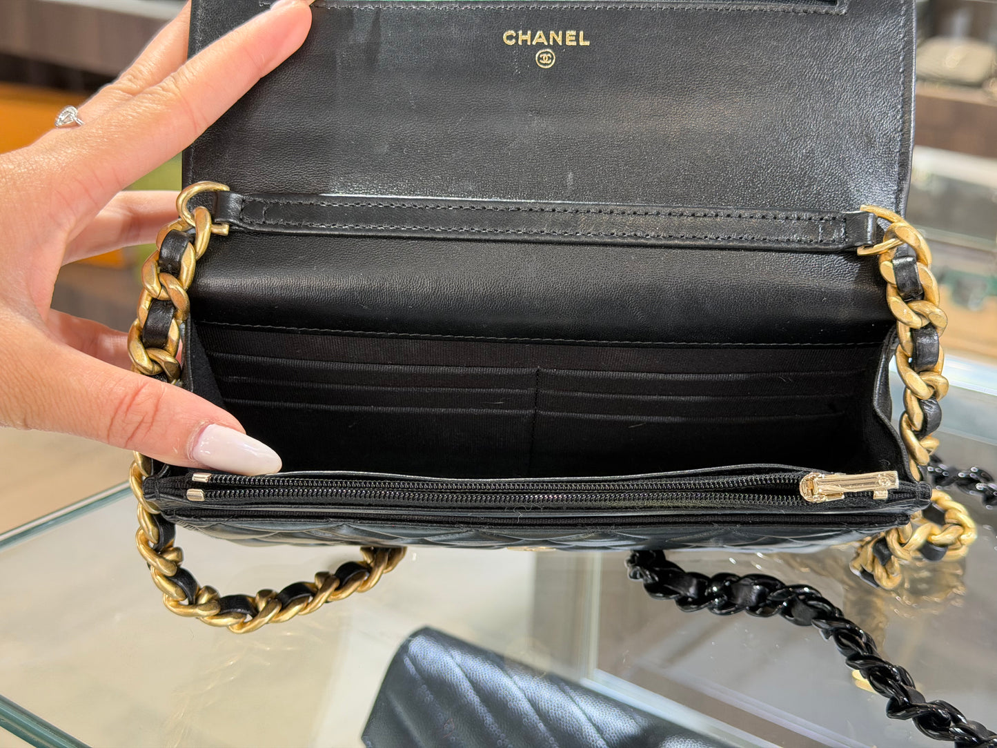 Pre-Owned CC Black Quilted Lambskin WOC Gold Hardware