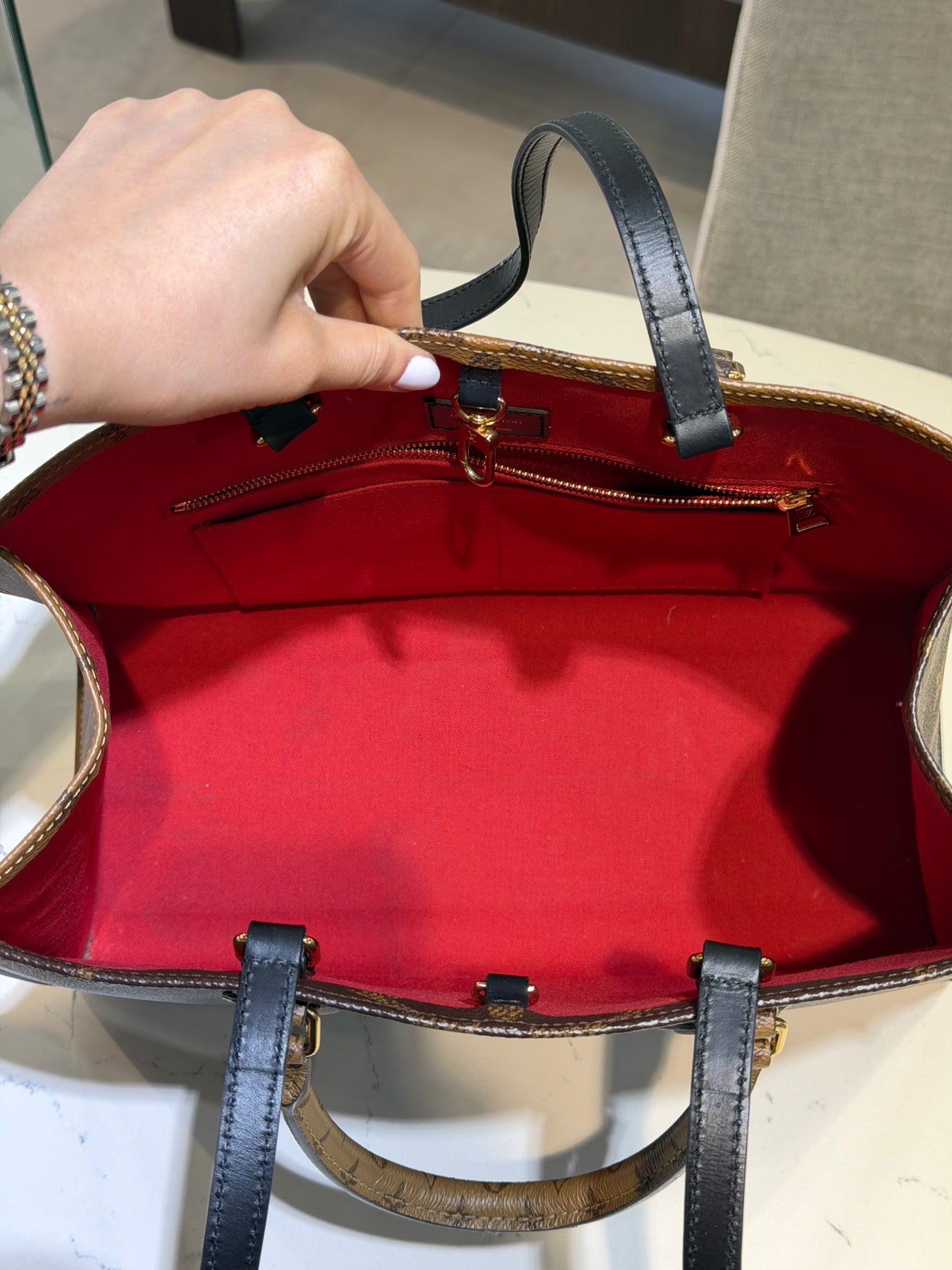 Pre-Owned LV OnTheGo MM Reverse Monogram
