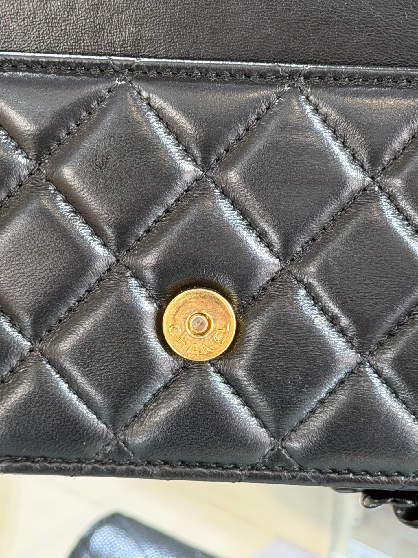 Pre-Owned CC Black Quilted Lambskin WOC Gold Hardware