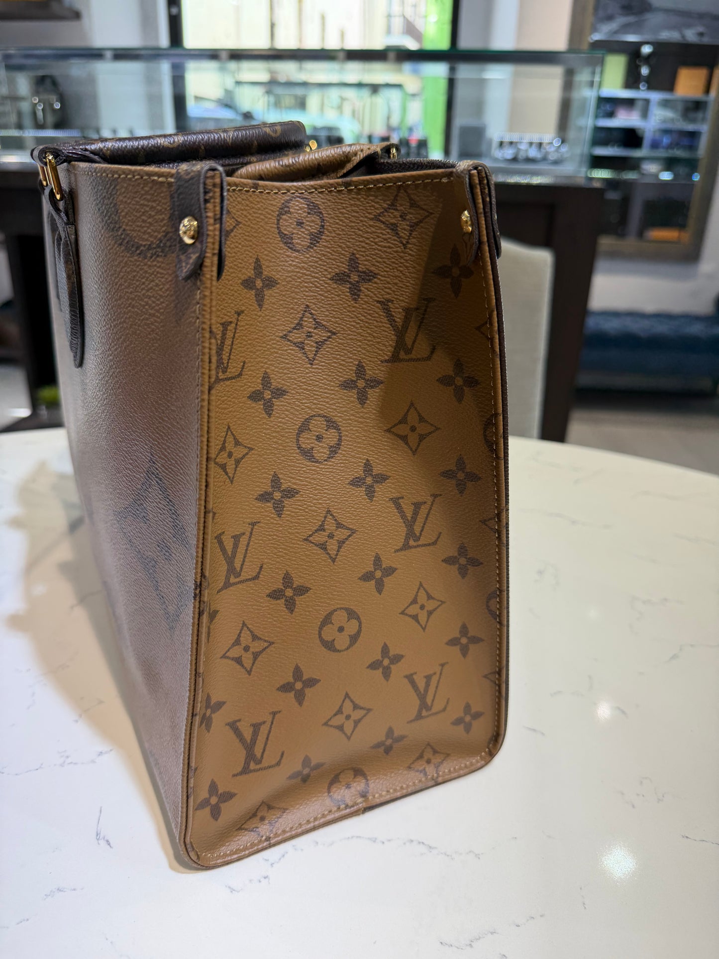 Pre-Owned LV OnTheGo MM Reverse Monogram