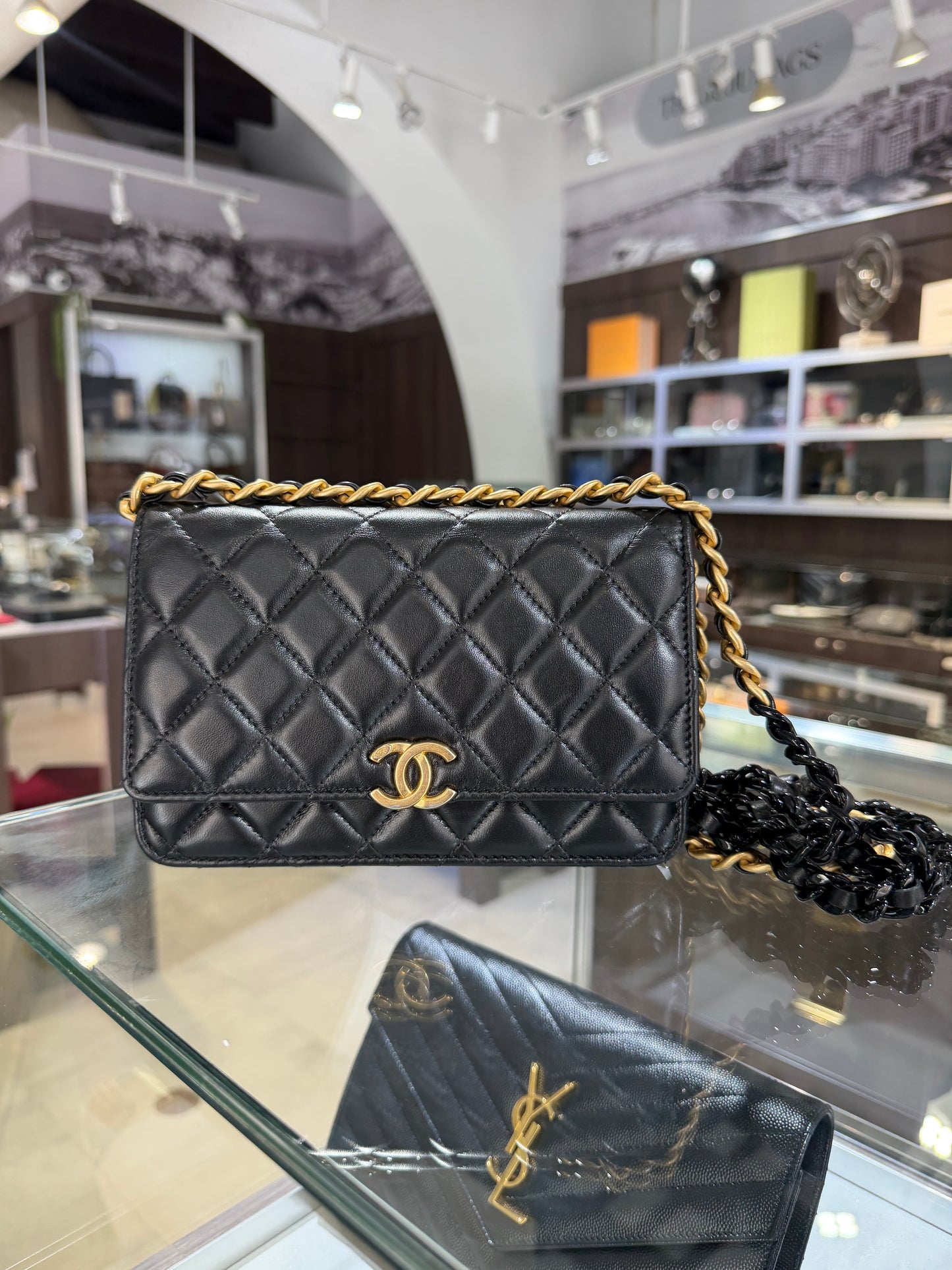Pre-Owned CC Black Quilted Lambskin WOC Gold Hardware