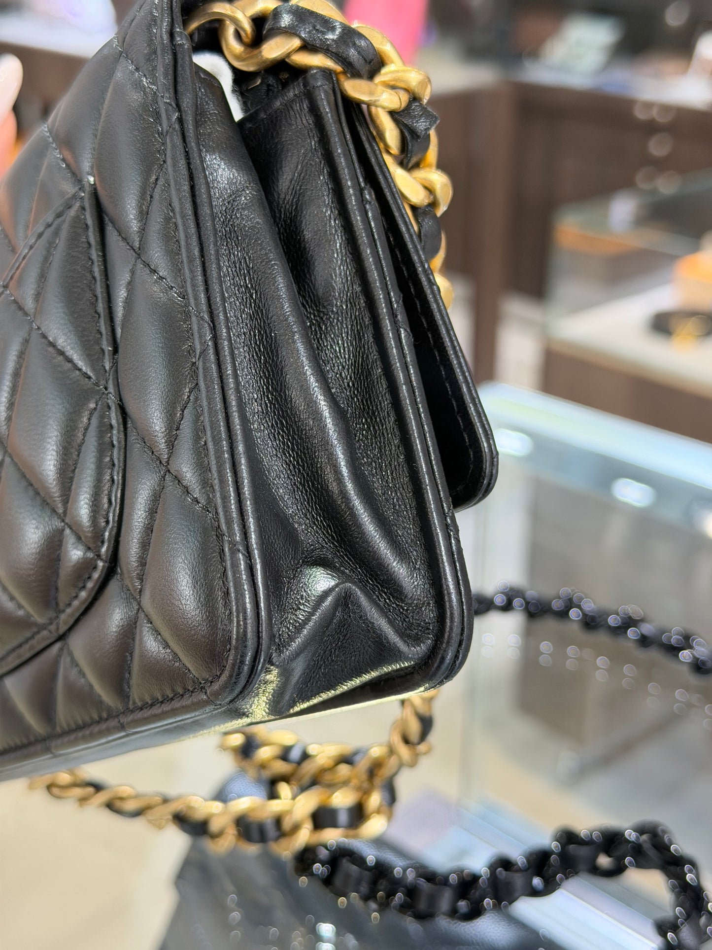 Pre-Owned CC Black Quilted Lambskin WOC Gold Hardware