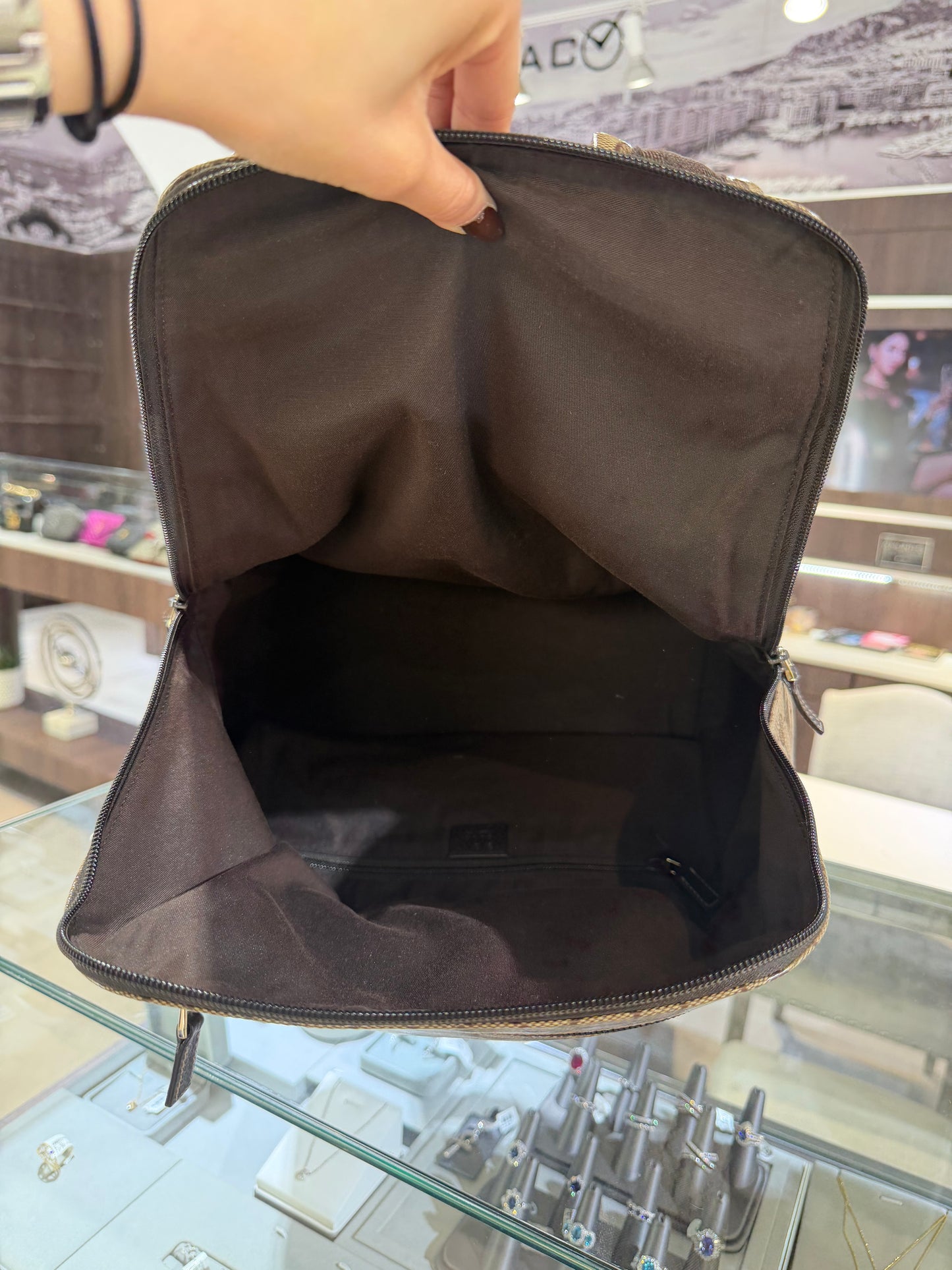 Gucci GG Coated Canvas Backpack